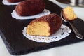 Homemade cake without baking named potato on a black tile. Selective focus. Royalty Free Stock Photo