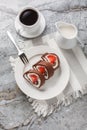 Homemade cake roll with strawberry and cream cheese closeup. Vertical top view Royalty Free Stock Photo