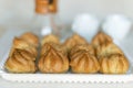 Homemade cakes profiteroles eclairs sweet dessert, selective focus.