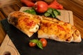 Homemade calzone with a wood table