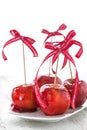 Homemade candied apples with a red bow