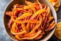 Homemade candied orange peel in a bowl