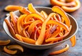 Homemade candied orange peel in a bowl