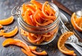 Homemade candied orange peel in a bowl