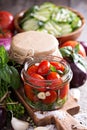 Homemade canned tomatoes with dill and garlic