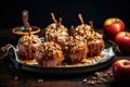 homemade caramel apples with nuts on tray Royalty Free Stock Photo