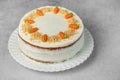 Homemade carrot cake made with walnuts, iced with cream cheese. Sweet dessert Royalty Free Stock Photo