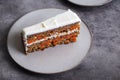 Homemade carrot cake in section on plate