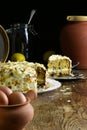 Homemade Carrot Cake and slice on Glass and tin Plate Fresh Eggs Royalty Free Stock Photo