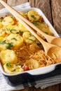 Homemade casserole of sauerkraut with potatoes, bacon and cheese