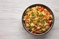 Homemade Cauliflower Fried Rice with Chives and Sesame Seeds in a Bowl, top view. Flat lay, overhead, from above. Copy space Royalty Free Stock Photo