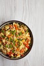 Homemade Cauliflower Fried Rice with Chives and Sesame Seeds in a Bowl, top view. Flat lay, overhead, from above. Copy space Royalty Free Stock Photo