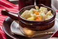 Homemade cauliflower soup in a brown bowl. Royalty Free Stock Photo