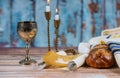 Homemade challah, wine and candles for Shabbat