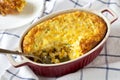Homemade Cheddar Corn Pudding Casserole, low angle view. Close-up Royalty Free Stock Photo