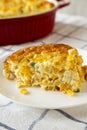 Homemade Cheddar Corn Pudding Casserole on a white plate, side view. Close-up Royalty Free Stock Photo