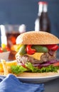 Homemade cheese burger with peppers tomato onion Royalty Free Stock Photo