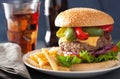 Homemade cheese burger with peppers tomato onion Royalty Free Stock Photo