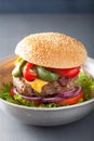 Homemade cheese burger with peppers tomato onion Royalty Free Stock Photo