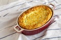 Homemade Cheese Corn Pudding Casserole on cloth, low angle view. Close-up Royalty Free Stock Photo