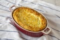 Homemade Cheese Corn Pudding Casserole on cloth, side view. Close-up Royalty Free Stock Photo