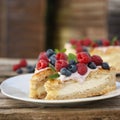 Homemade cheesecake with fresh berries and mint for dessert - healthy organic summer dessert pie cheesecake. Royalty Free Stock Photo