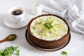 Homemade cheesecake with lime and mint for dessert - healthy organic summer dessert pie cheesecake. Cheese cake with a cup of Royalty Free Stock Photo