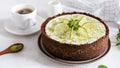 Homemade cheesecake with lime and mint for dessert - healthy organic summer dessert pie cheesecake. Cheese cake with a cup of Royalty Free Stock Photo