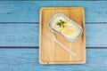 Homemade cheesecake with topping Durian fruit on a blue wood background Royalty Free Stock Photo