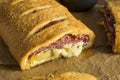 Homemade Cheesy and Meaty Italian Stromboli Royalty Free Stock Photo