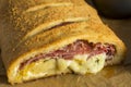 Homemade Cheesy and Meaty Italian Stromboli Royalty Free Stock Photo