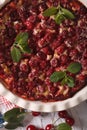 Homemade cherry Clafoutis close up in a dish. vertical top view Royalty Free Stock Photo