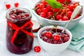 Homemade cherry jam in sugar syrup in glass jar Royalty Free Stock Photo