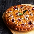 Homemade Cherry pie with almond, square.