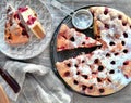 Homemade Cherry pie on round serving board. Royalty Free Stock Photo