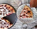 Homemade Cherry pie on round serving board. Royalty Free Stock Photo