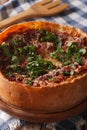 Homemade Chicago deep dish pizza closeup. Vertical