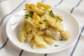 Homemade Chicken Alfredo Pasta Bake with Parsley, side view. Close-up Royalty Free Stock Photo