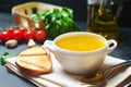 Homemade chicken bouillon or broth. healthy breakfast. black concrete background. selective focus.