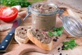 Homemade chicken liver pate on baguette adn with tomatoes