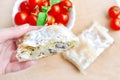 Woman hand holding fresh piece of savory strudel stuffed with chicken meat Royalty Free Stock Photo