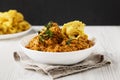 Homemade Chicken Tikka Masala in a white bowl, low angle view. Close-up Royalty Free Stock Photo