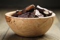 Homemade chocolate with almonds in wood bowl Royalty Free Stock Photo