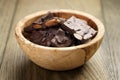 Homemade chocolate with almonds in wood bowl Royalty Free Stock Photo