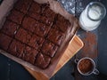 Homemade chocolate brownies on cutting board, top view Royalty Free Stock Photo