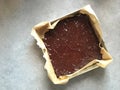 Homemade chocolate brownies in pan with sea salt, parchment paper Royalty Free Stock Photo