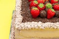 Homemade chocolate cake covered with chocolate sprinkles and fresh strawberries. Known in Brazil as "Bolo de Brigadeiro" Royalty Free Stock Photo