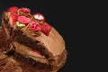 Homemade chocolate cake with strawberrys on black