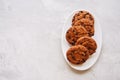 Homemade chocolate chip cookies in a plate on a white stone back Royalty Free Stock Photo