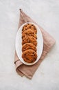 Homemade chocolate chip cookies in a plate on a white stone back Royalty Free Stock Photo